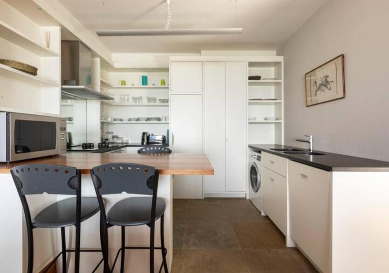 Seaview Apartment In Muizenberg Bagian luar foto